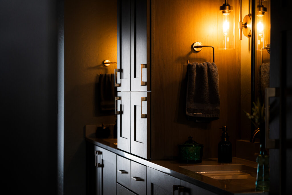 Custom dark cabinets in dramatic lighting